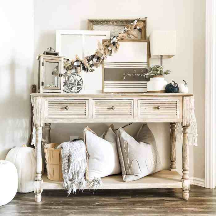 Console table decor behind sofa