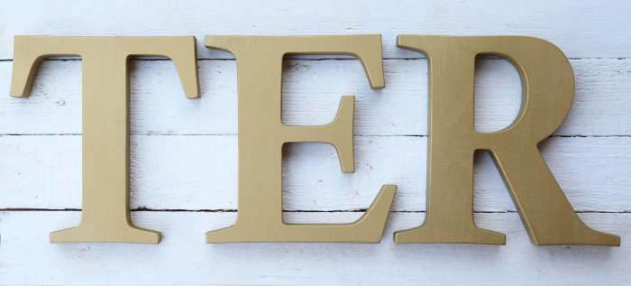 Gold wall decor letters