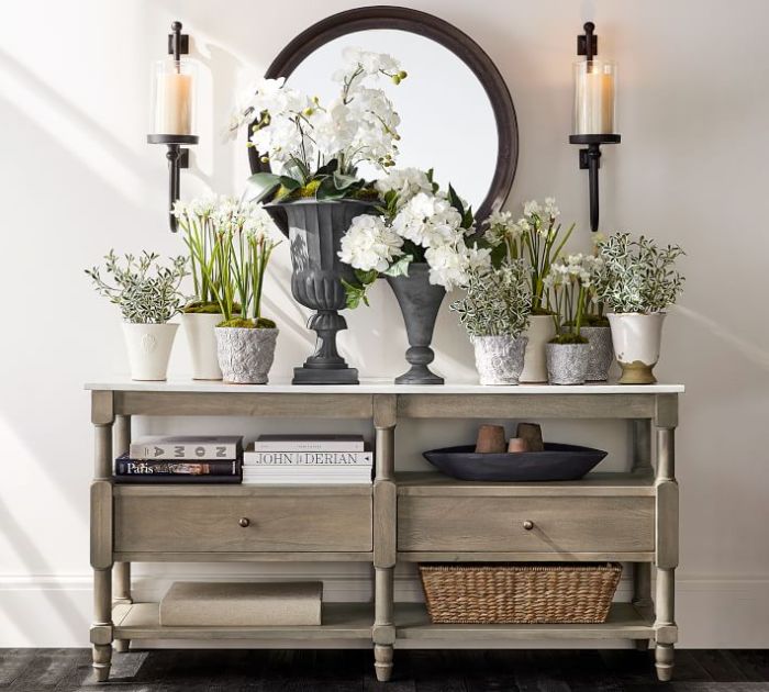 Console table decor behind sofa